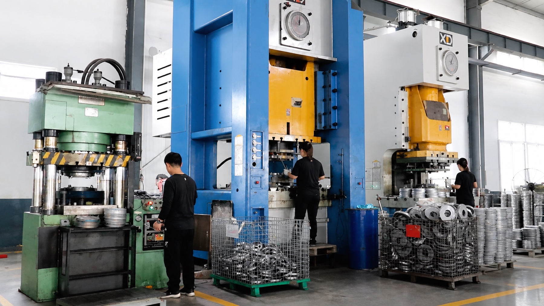Operators working in the CHUANGJIN stamping workshop